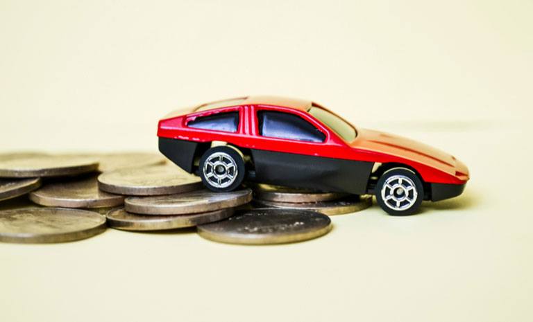 red toy car on quarters